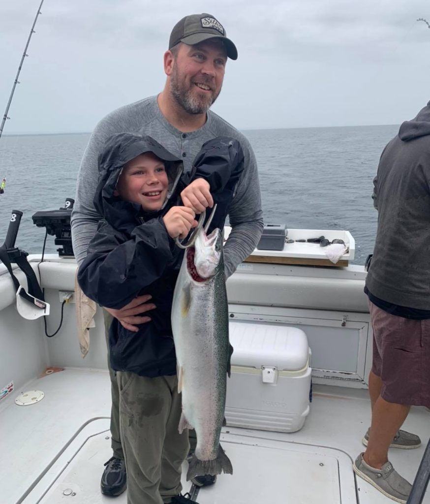 Angler with a large rainbow trout in Pennsylvania