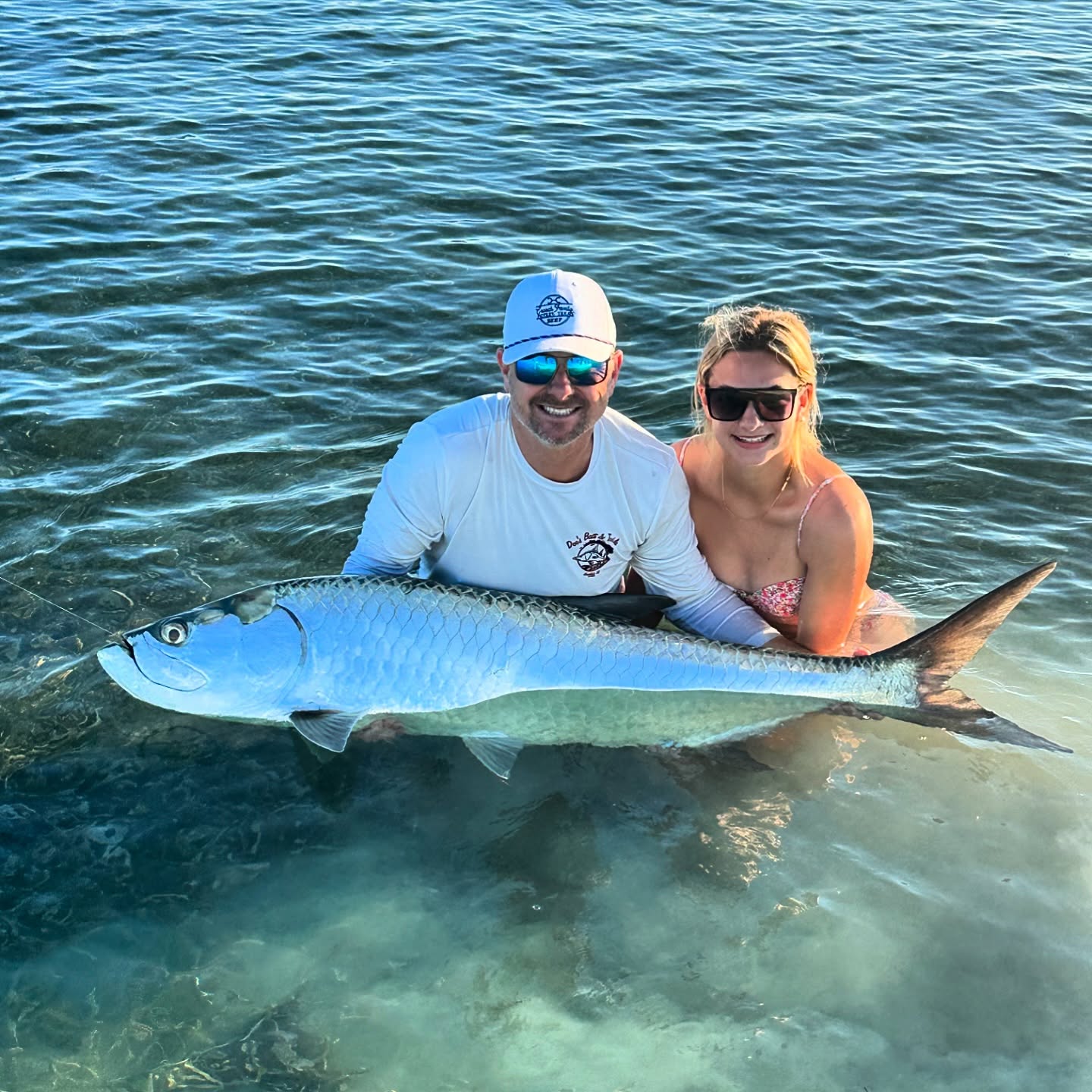 Two people fishing for a tarpon in Key West