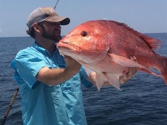 Lone angler with a big 23-inch fish in Orange Beach