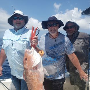 A group of 3 people fishing in Homosassa