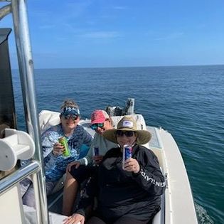 Two anglers enjoying a day of fishing in Florida