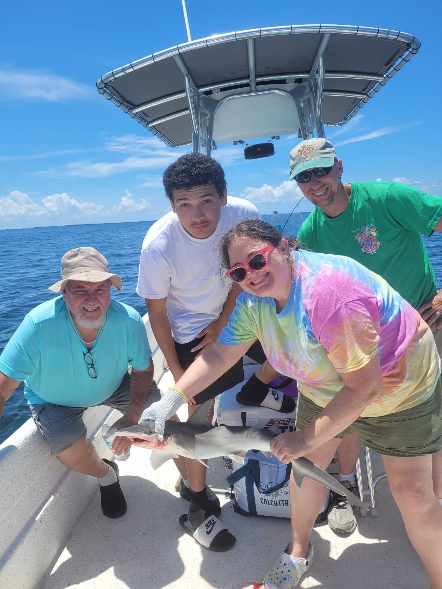 Cedar Key FL flats fishing guide boat targeting redfish and trout in shallow waters