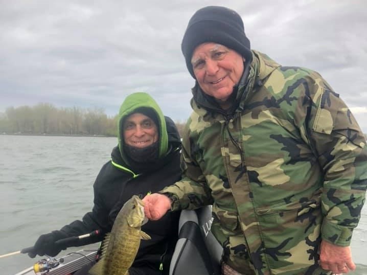two people fishing in erie