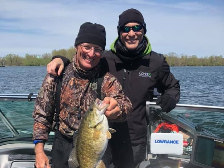 A photo of two people fishing in PA.