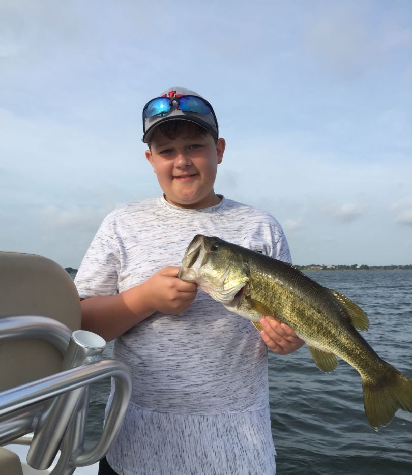 Largemouth bass fishing charter boat on Winter Haven Chain of Lakes, Central Florida