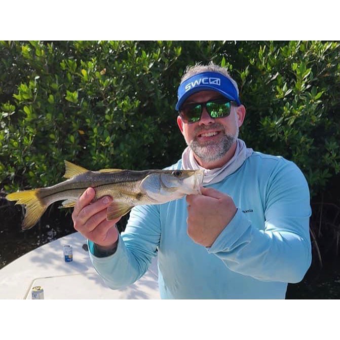 A snook fish caught by a person fishing in FL