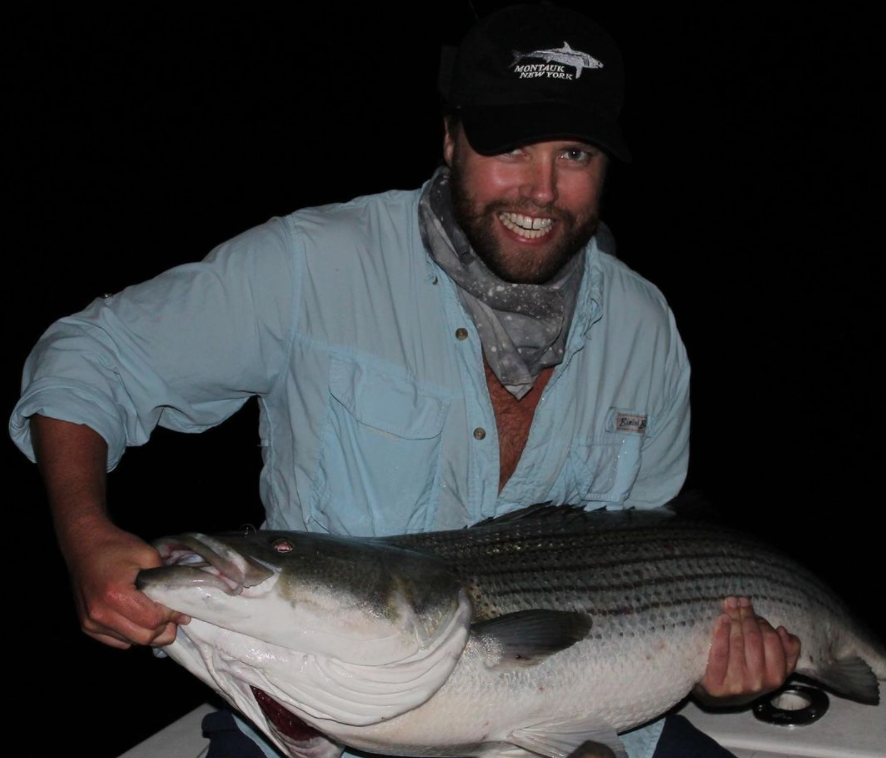 1 person holding a 21-inch fish in NY