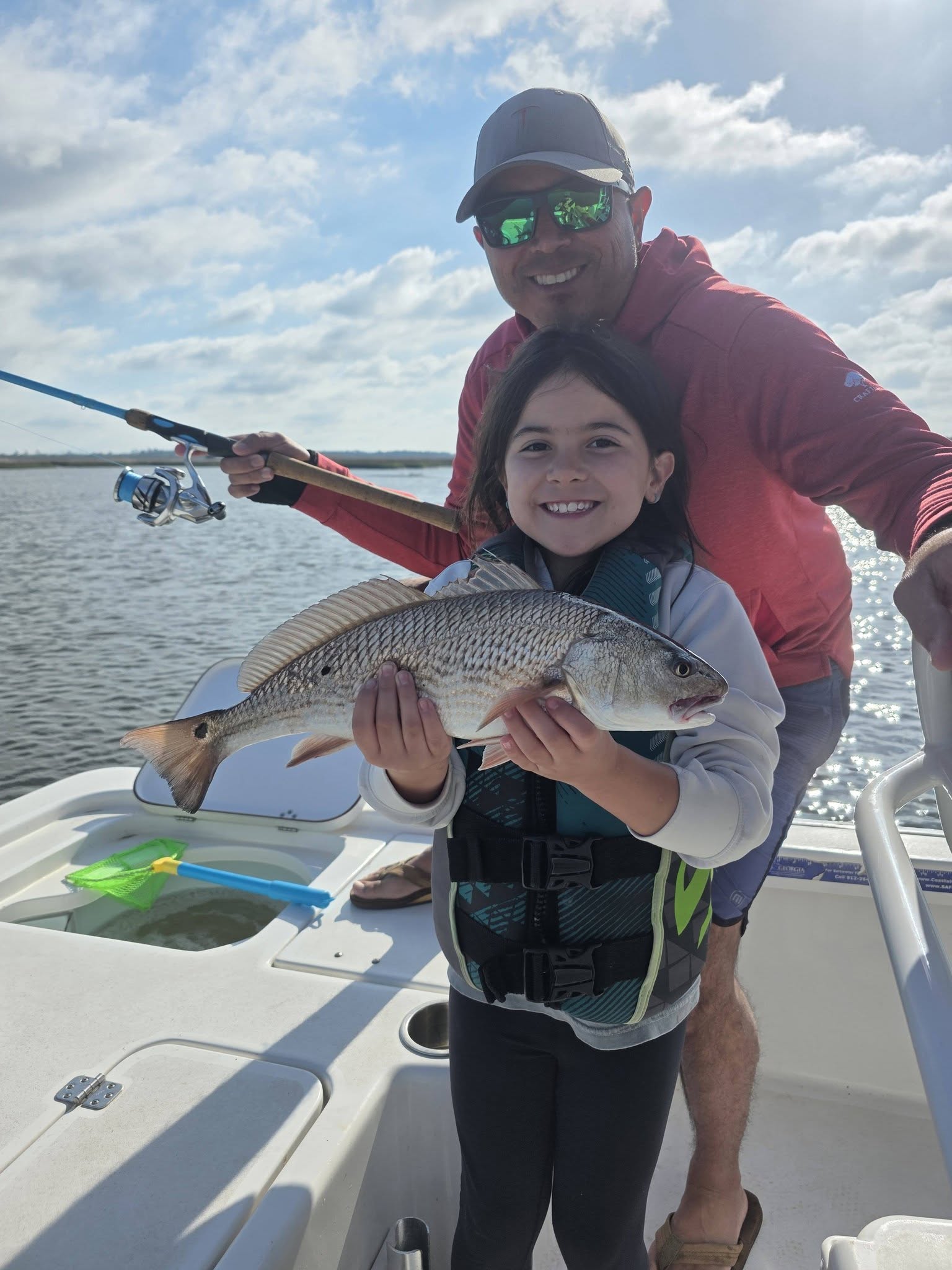 Redfish caught during fishing trip in Brunswick GA on boat deck