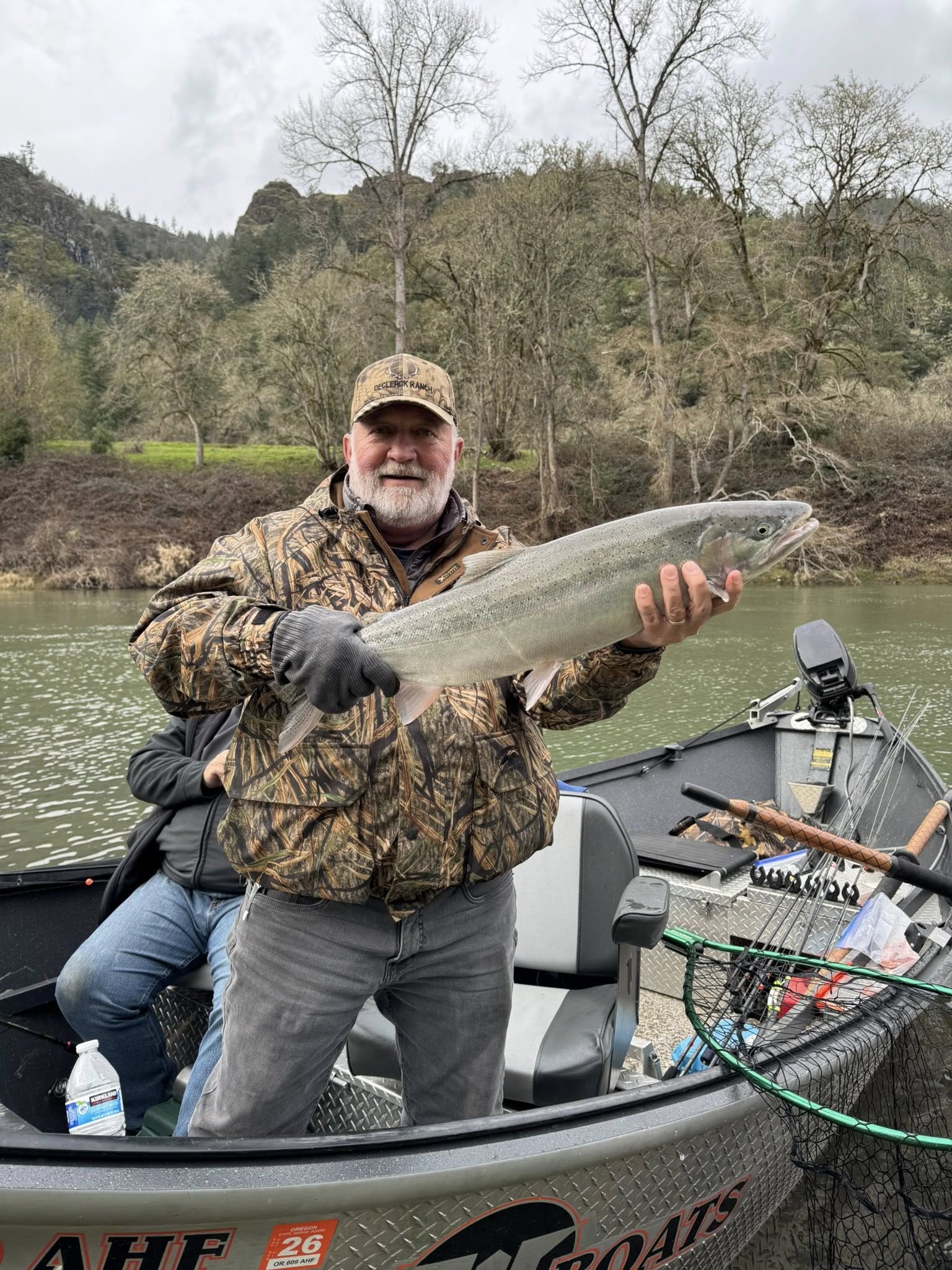 Large salmon caught while fishing from boat on river in Myrtle Creek OR