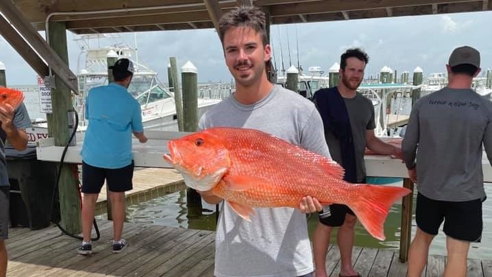 Two people fishing in Gulf Shores, Alabama