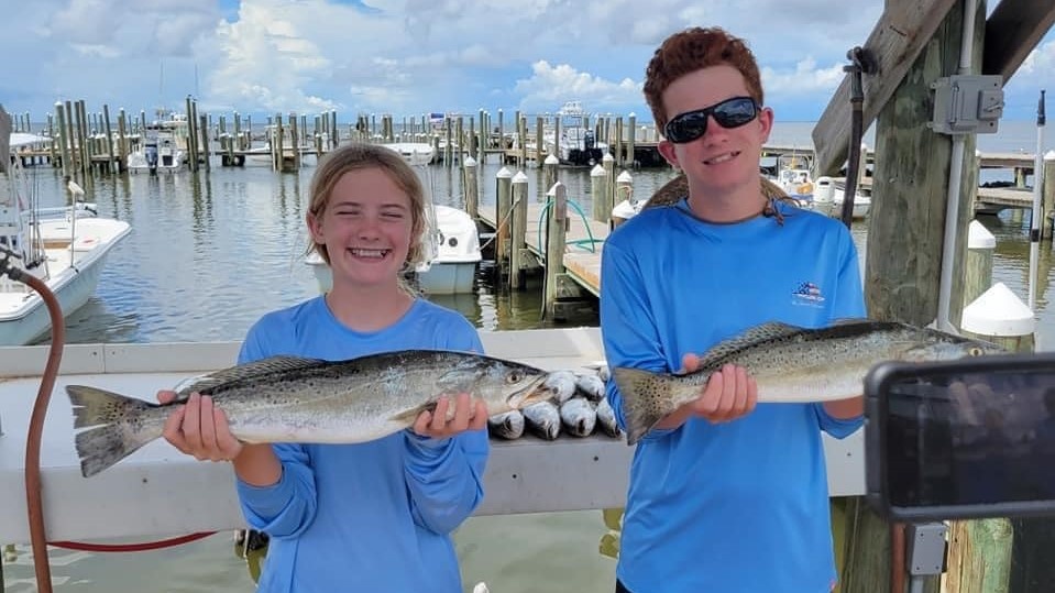 Two anglers with big fish in Alabama