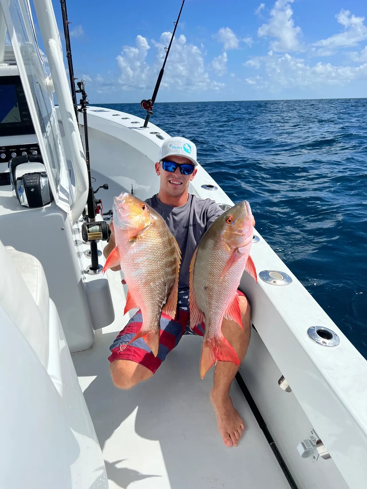 Two mutton snapper fish caught while fishing in Stuart