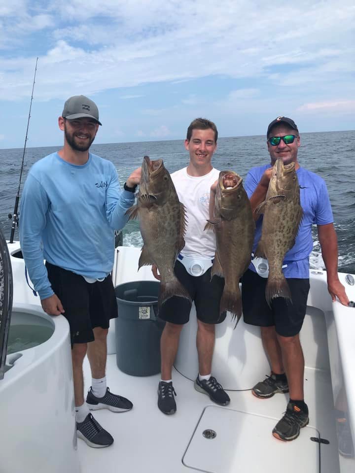 Three Gag Grouper, a huge fishing catch in Destin