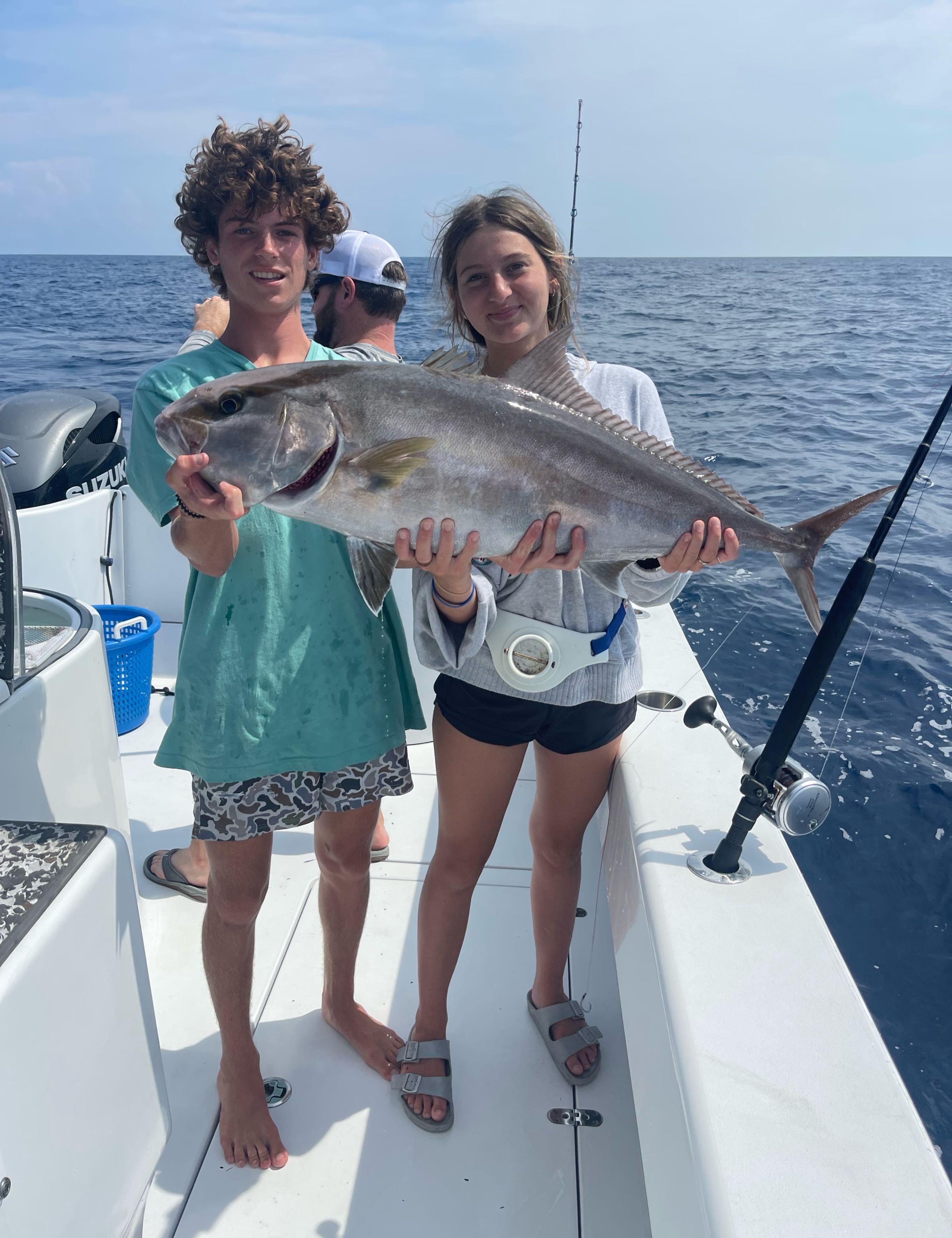 2 people fishing in FL with 1 big fish