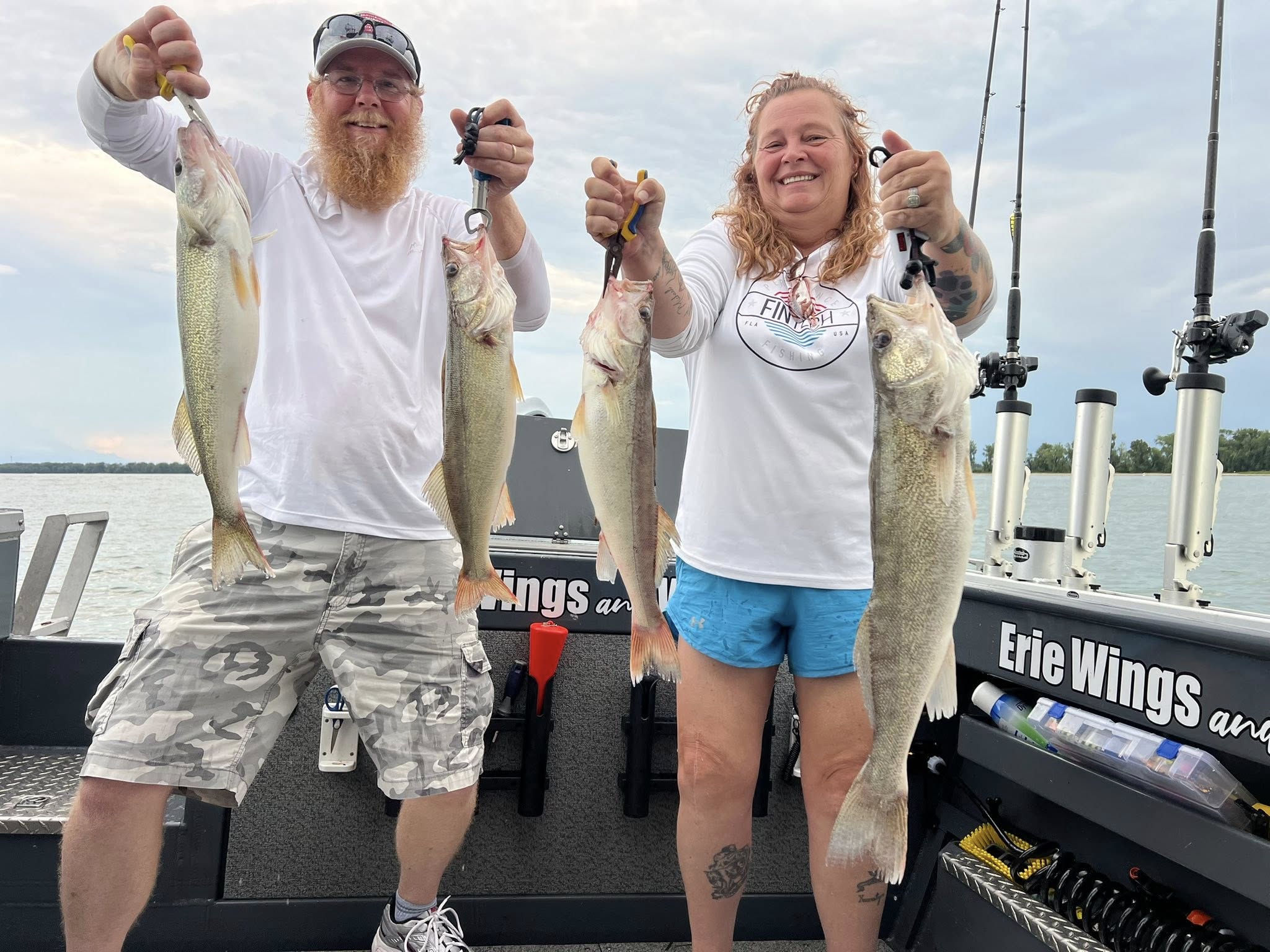 Two people fishing at the lakeside in Marblehead