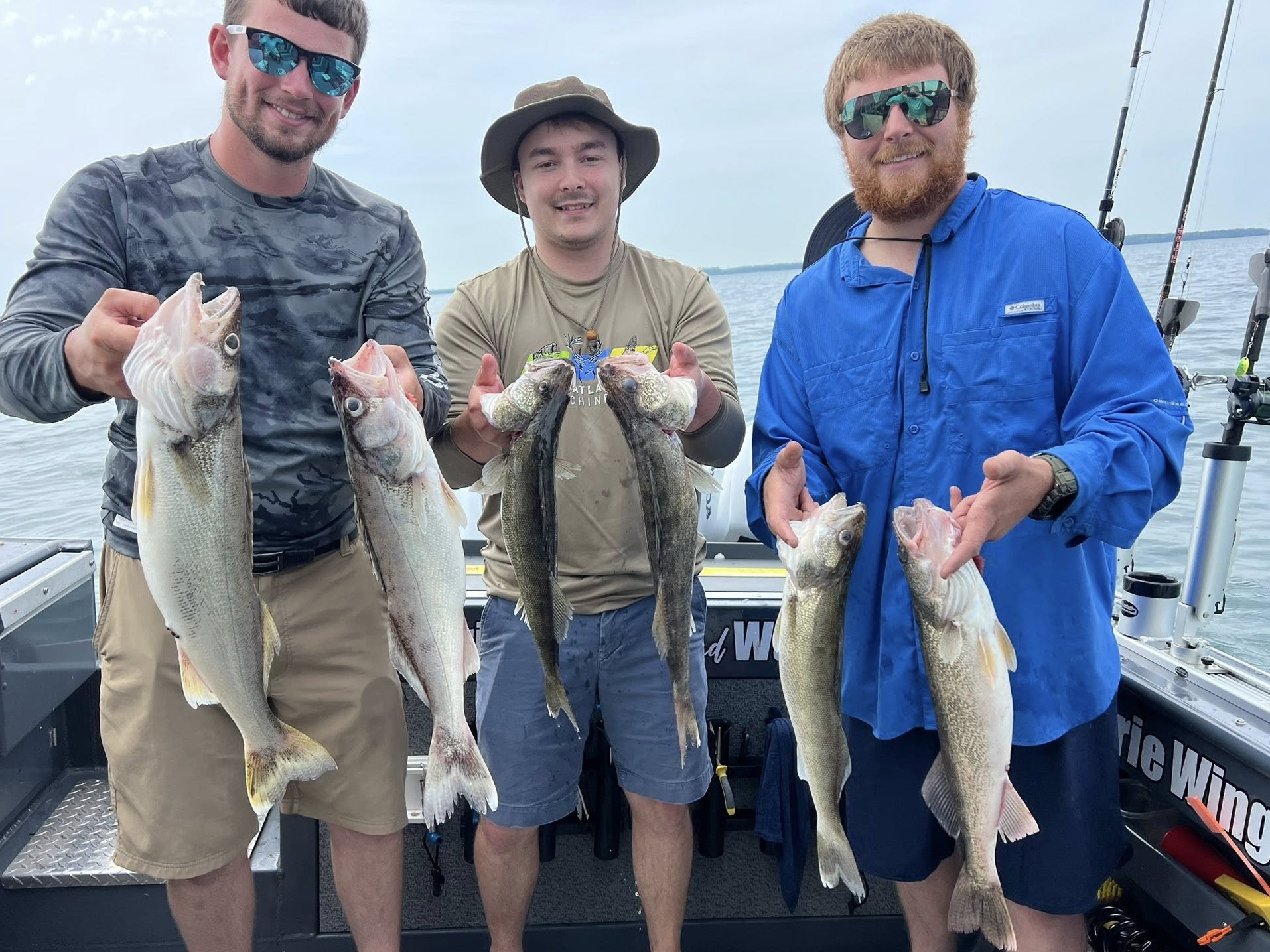 Lake Erie walleye fishing boat with Captain Mark, 26ft Hewescraft cabin for weekend trips