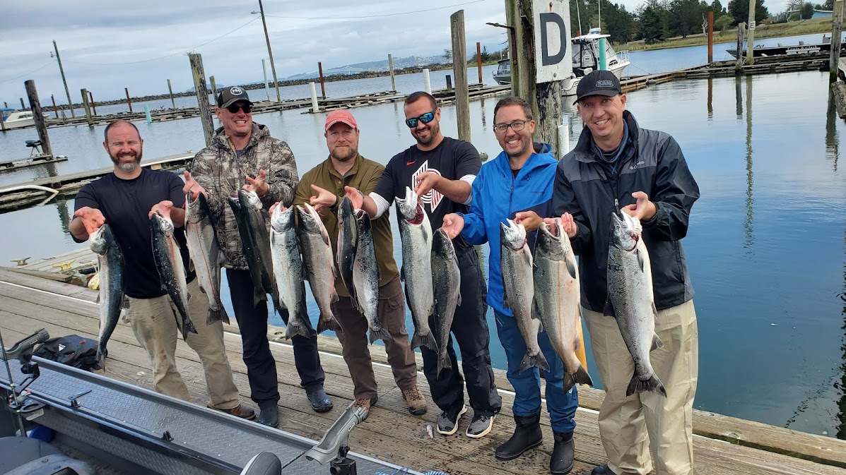Guided salmon fishing charter boat at Buoy 10, Columbia River mouth near Astoria, Oregon