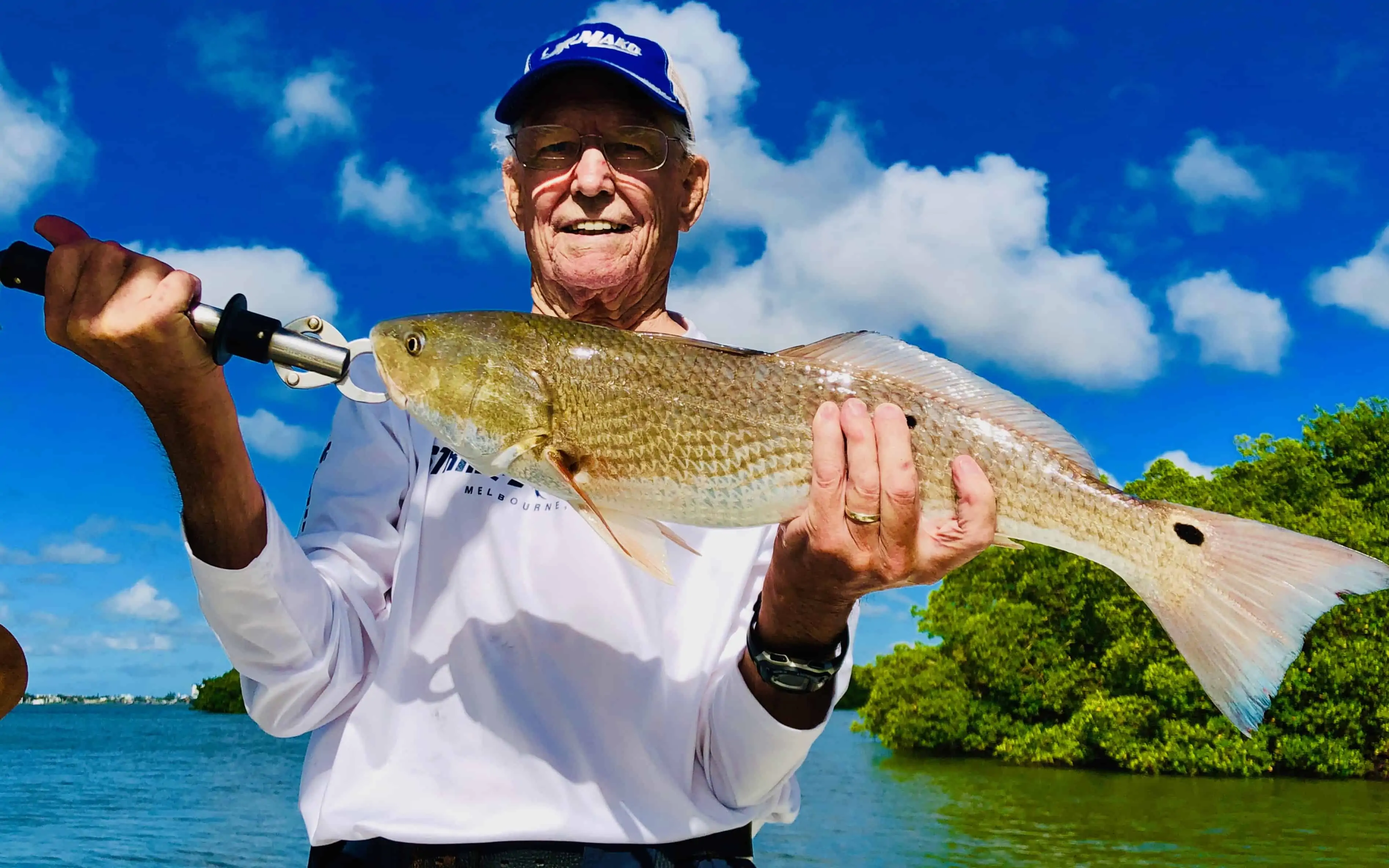 A single angler posing with their catch in FL