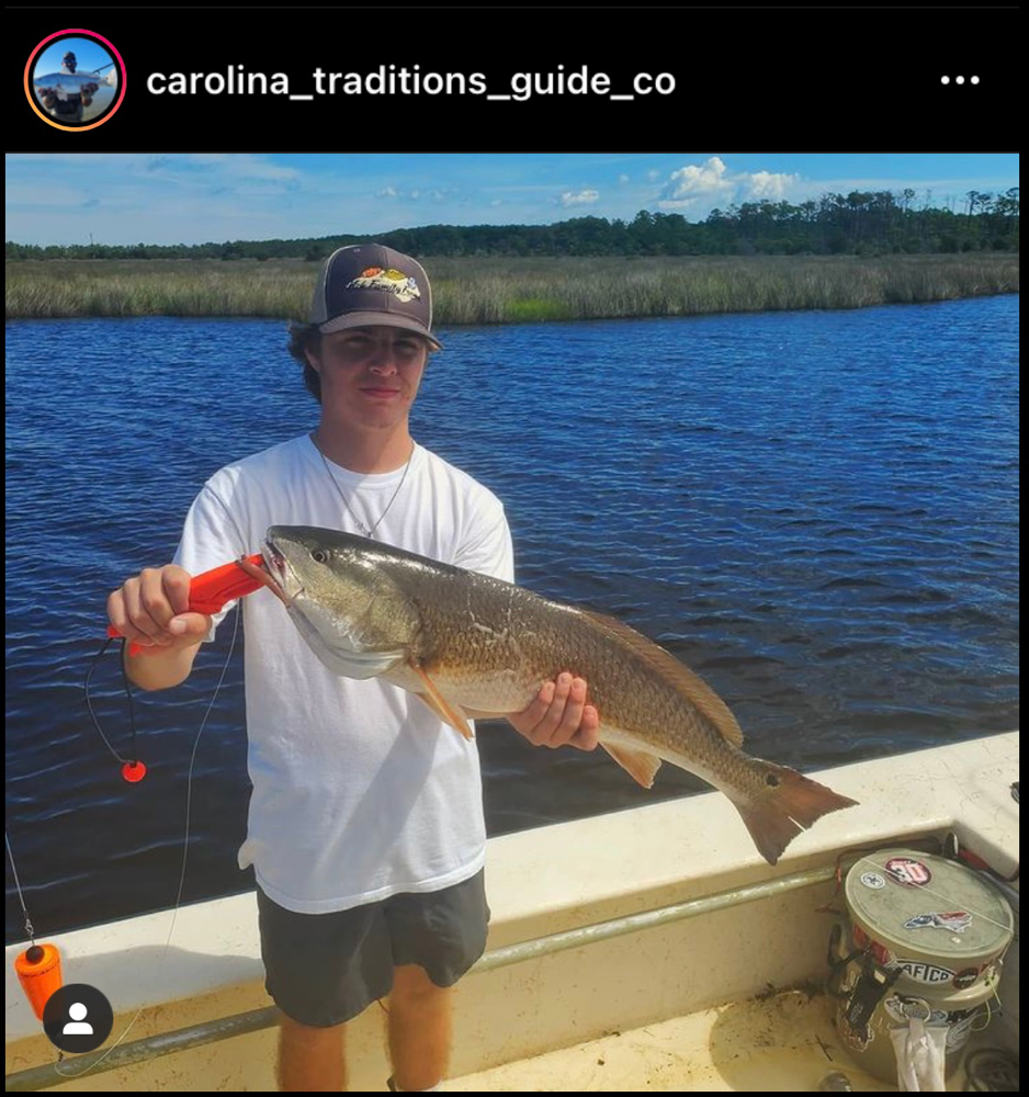 One person holding a fishing rod in Beaufort