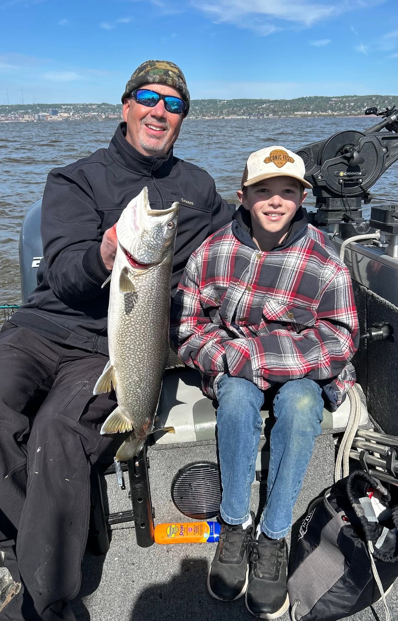 Lake trout fishing success on boat in Duluth MN waters