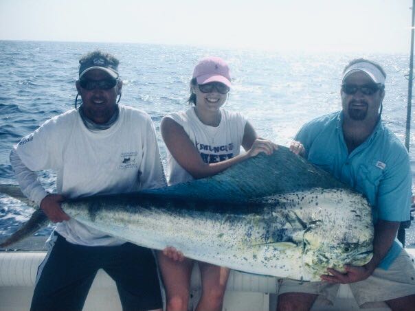 Large mahi mahi catch displayed on fishing boat in Key Largo FL