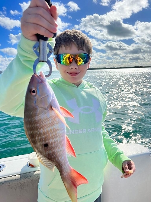 A Mutton Snapper, a 20-inch fish, caught while fishing in FL.