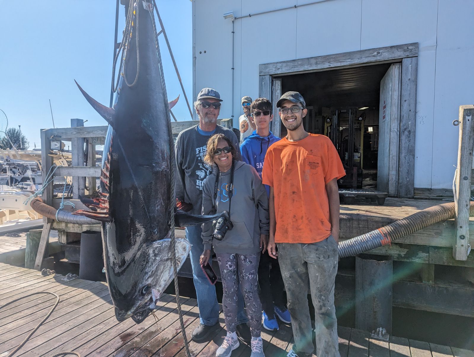 5 people fishing in MA