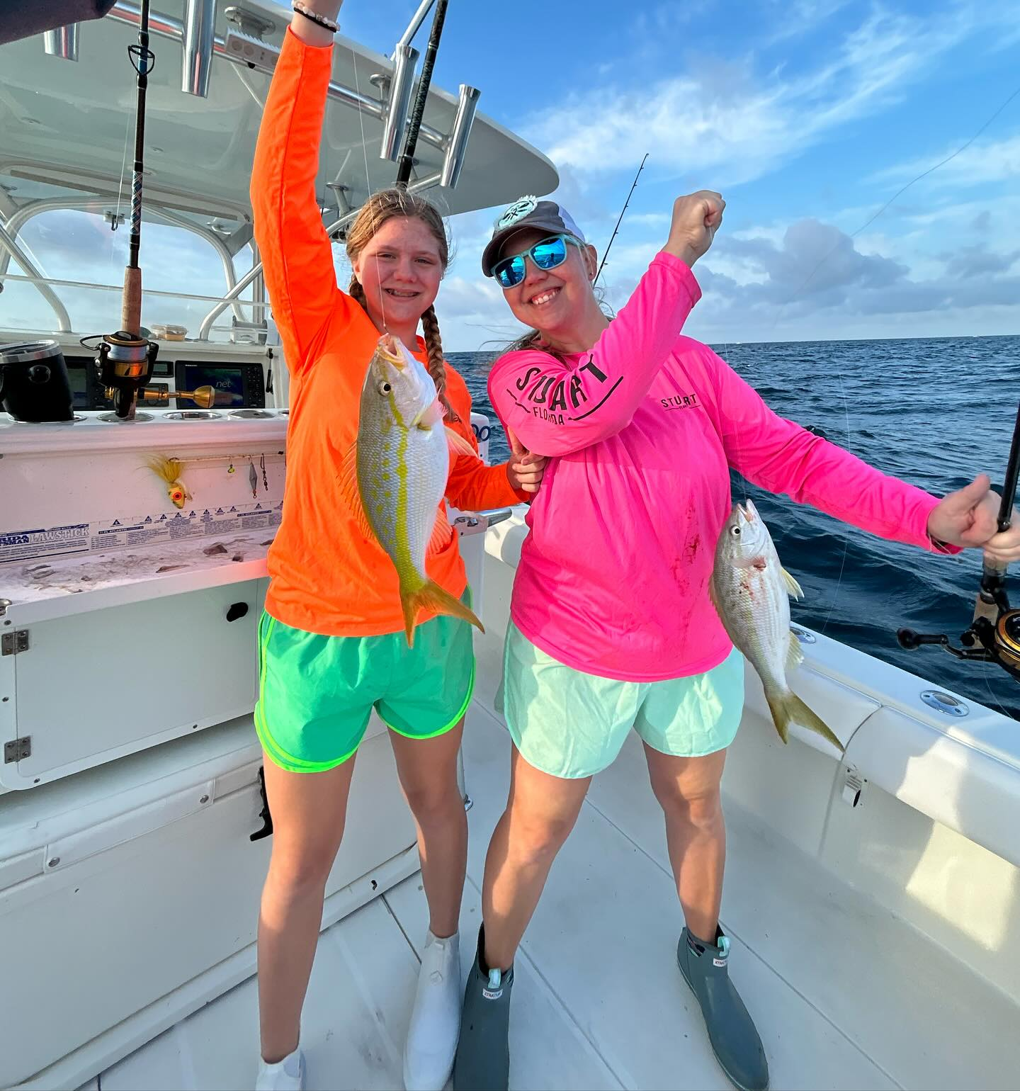 Two anglers with their fresh catch in Florida