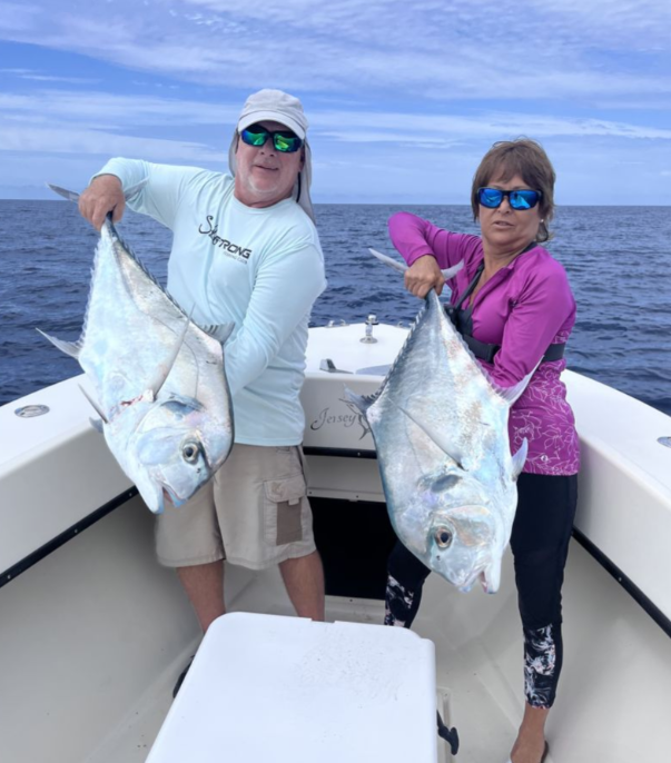 Two African Pompano fish caught while fishing in FL
