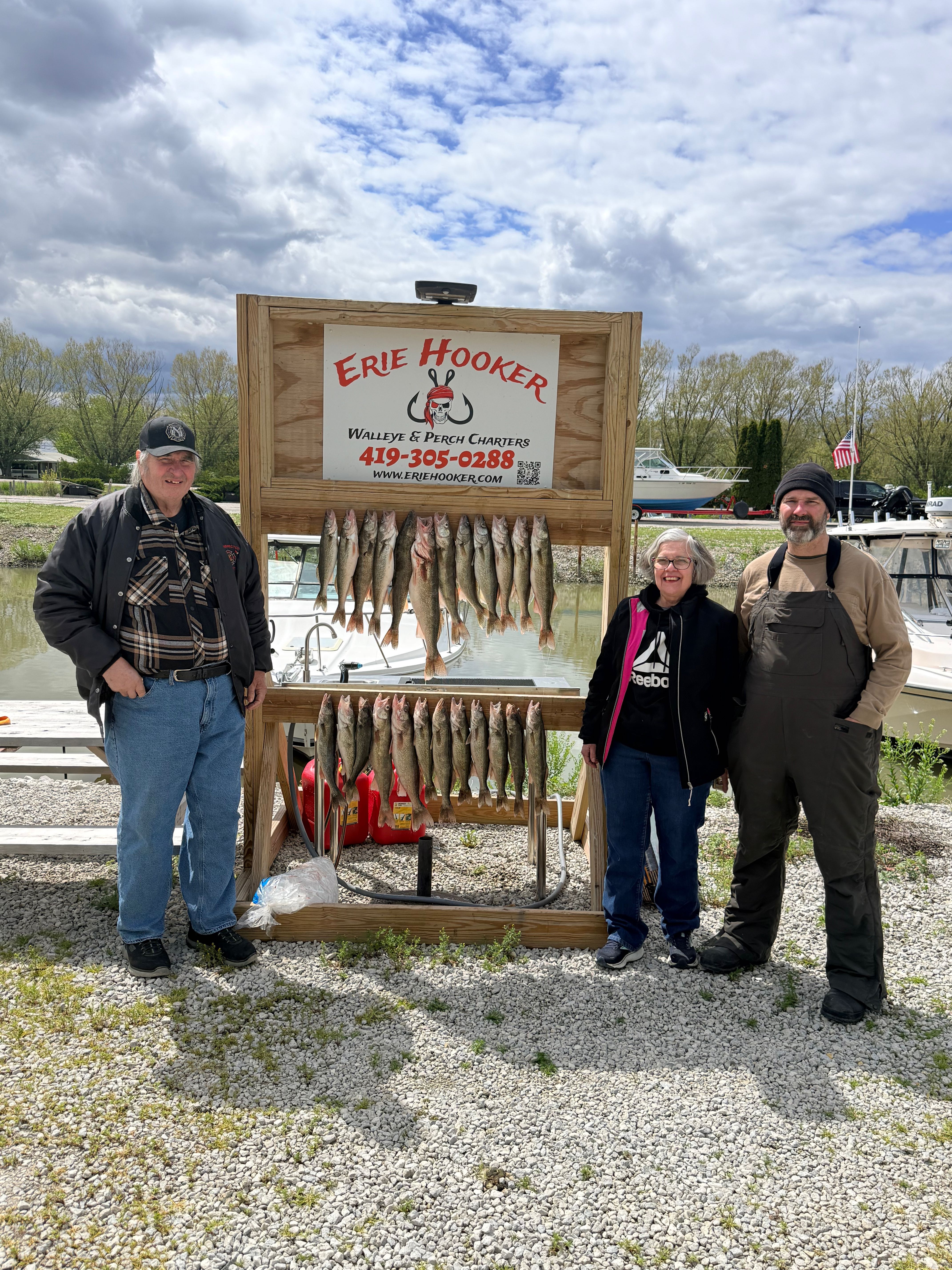 Fishing charter display board showing caught walleye and perch from Oak Harbor OH fishing trip