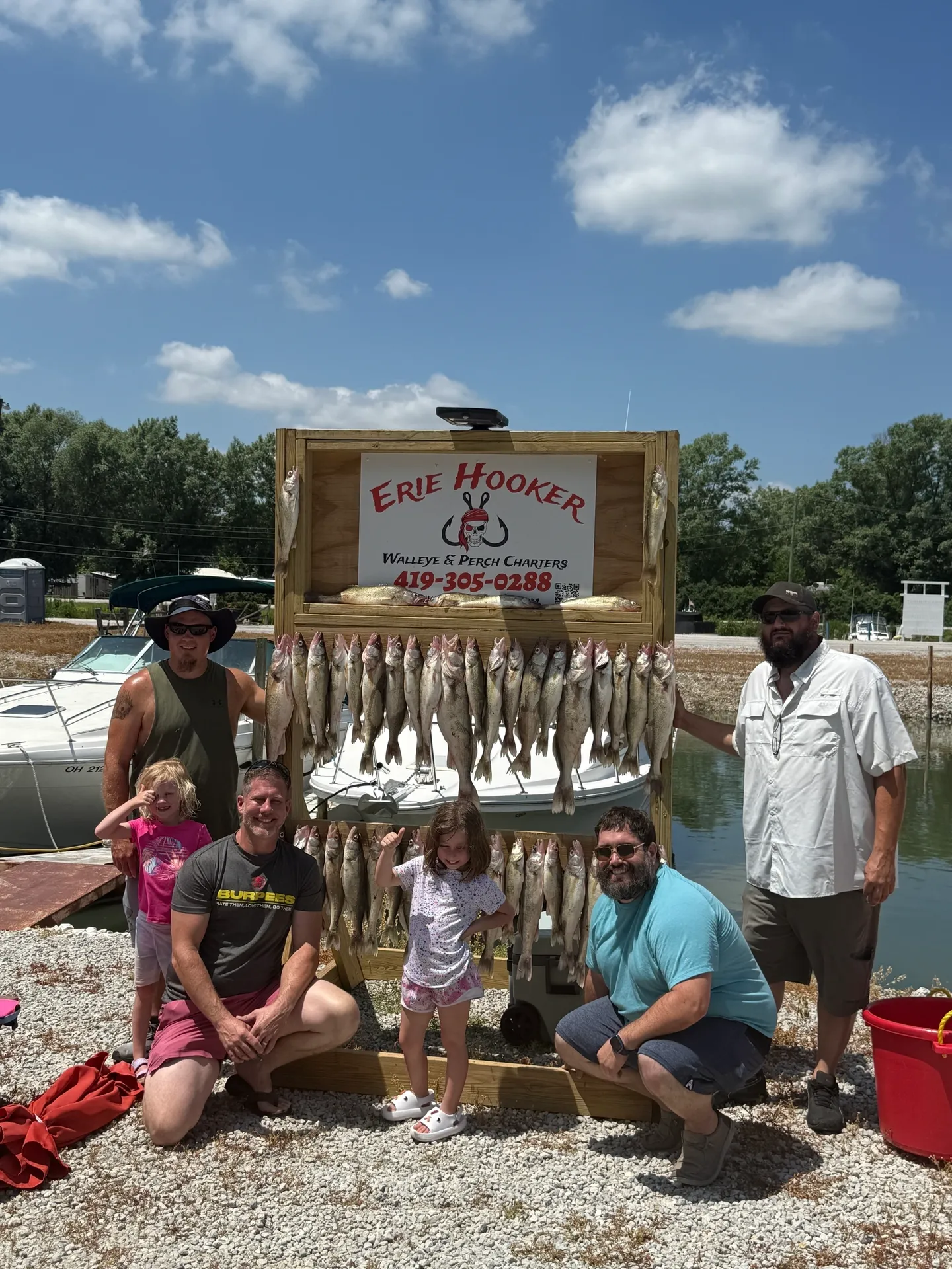Lake Erie walleye fishing charter boat near Oak Harbor with anglers trolling for fish