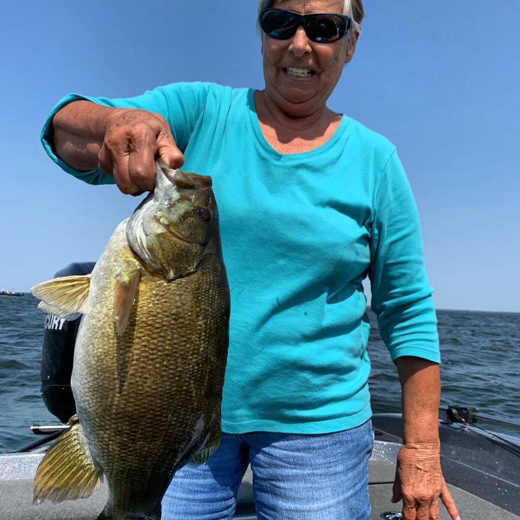 Angler holding a 18-inch fish in MN