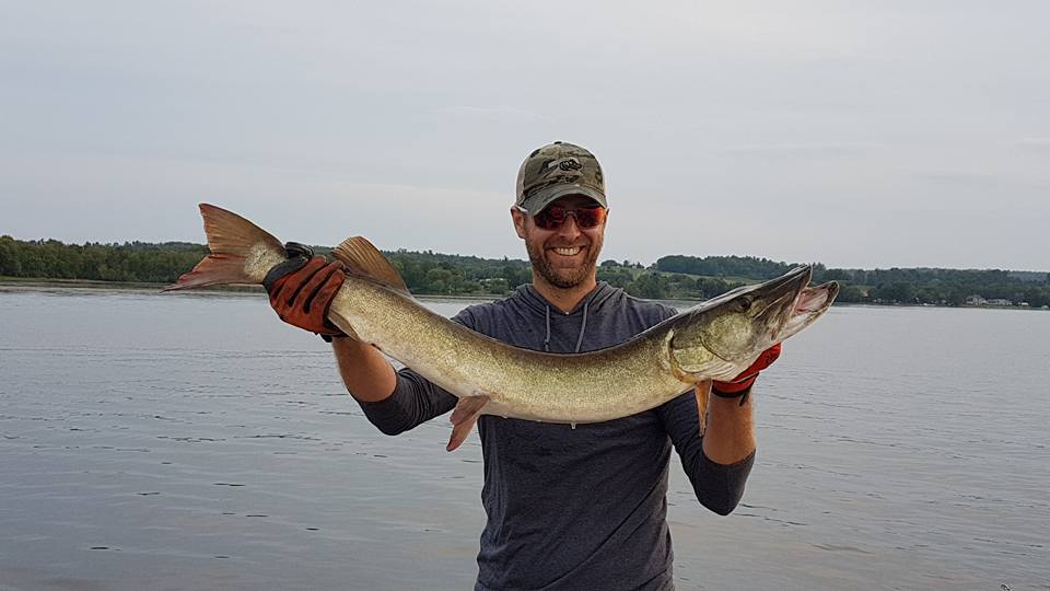 One fisherman with big fish in ON
