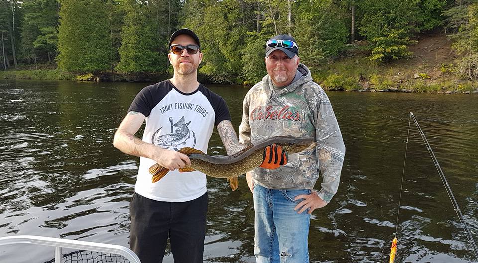 Two people fishing in Ontario, Canada