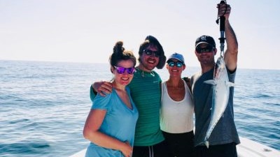 4 people fishing in FL with 1 small fish
