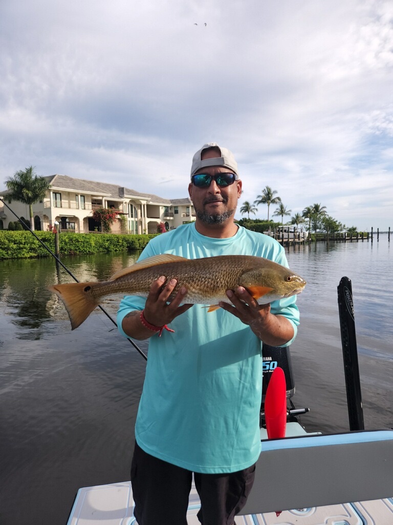 Angler with a 25-inch redfish in Matlacha