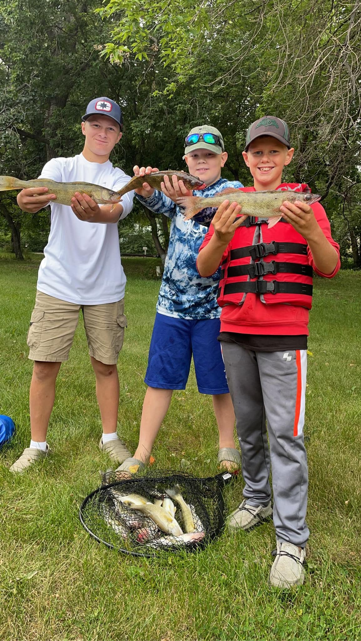 Two fishermen in Bismarck catching fish