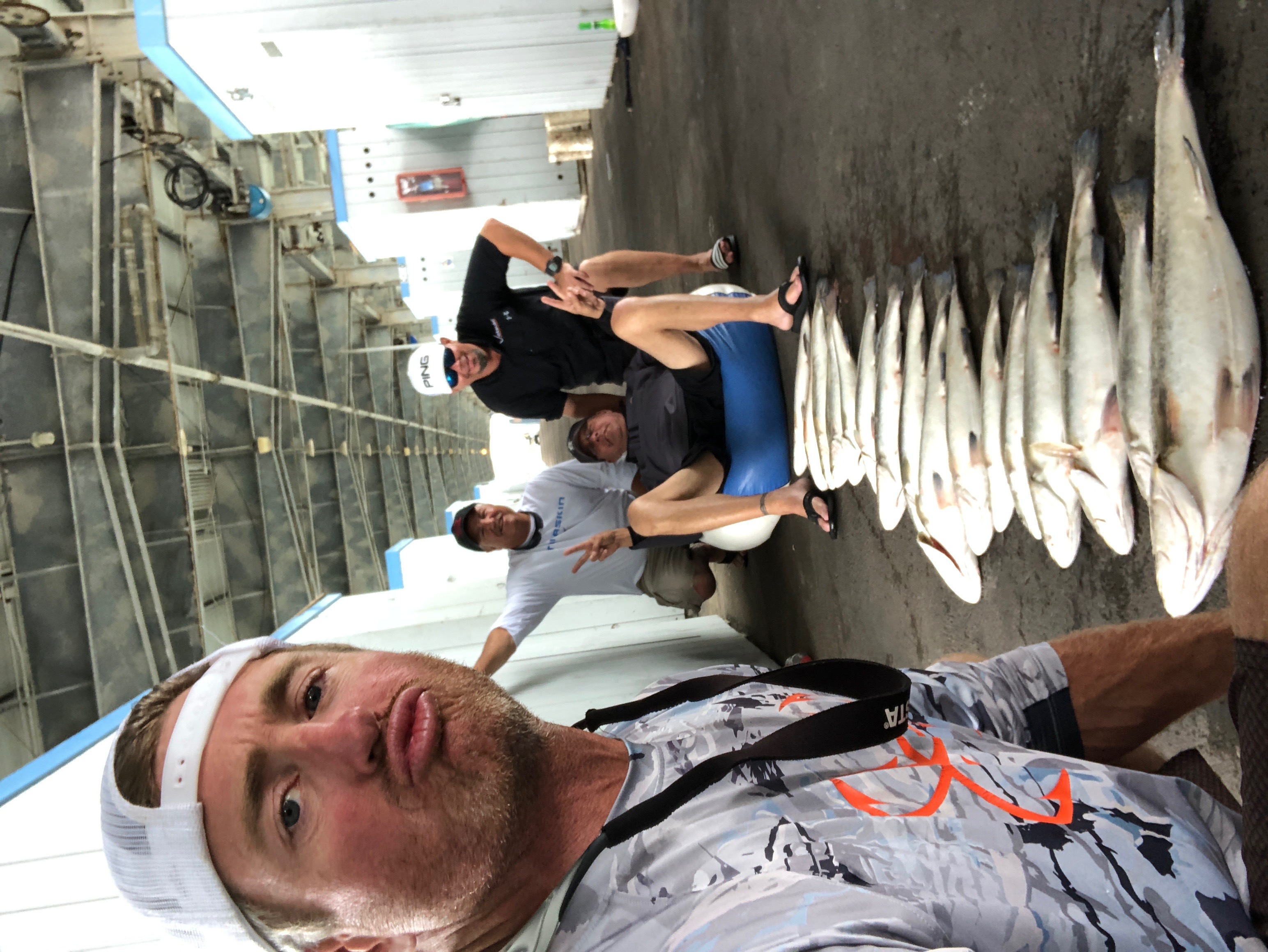 4 people fishing for unknown species in Galveston