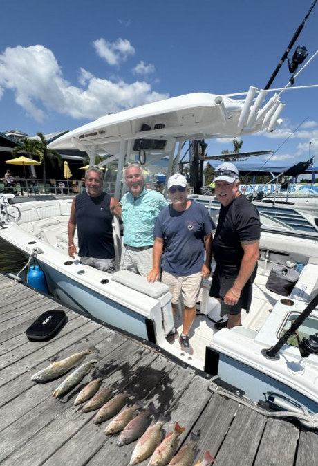 Four anglers fishing at Fort Myers Beach