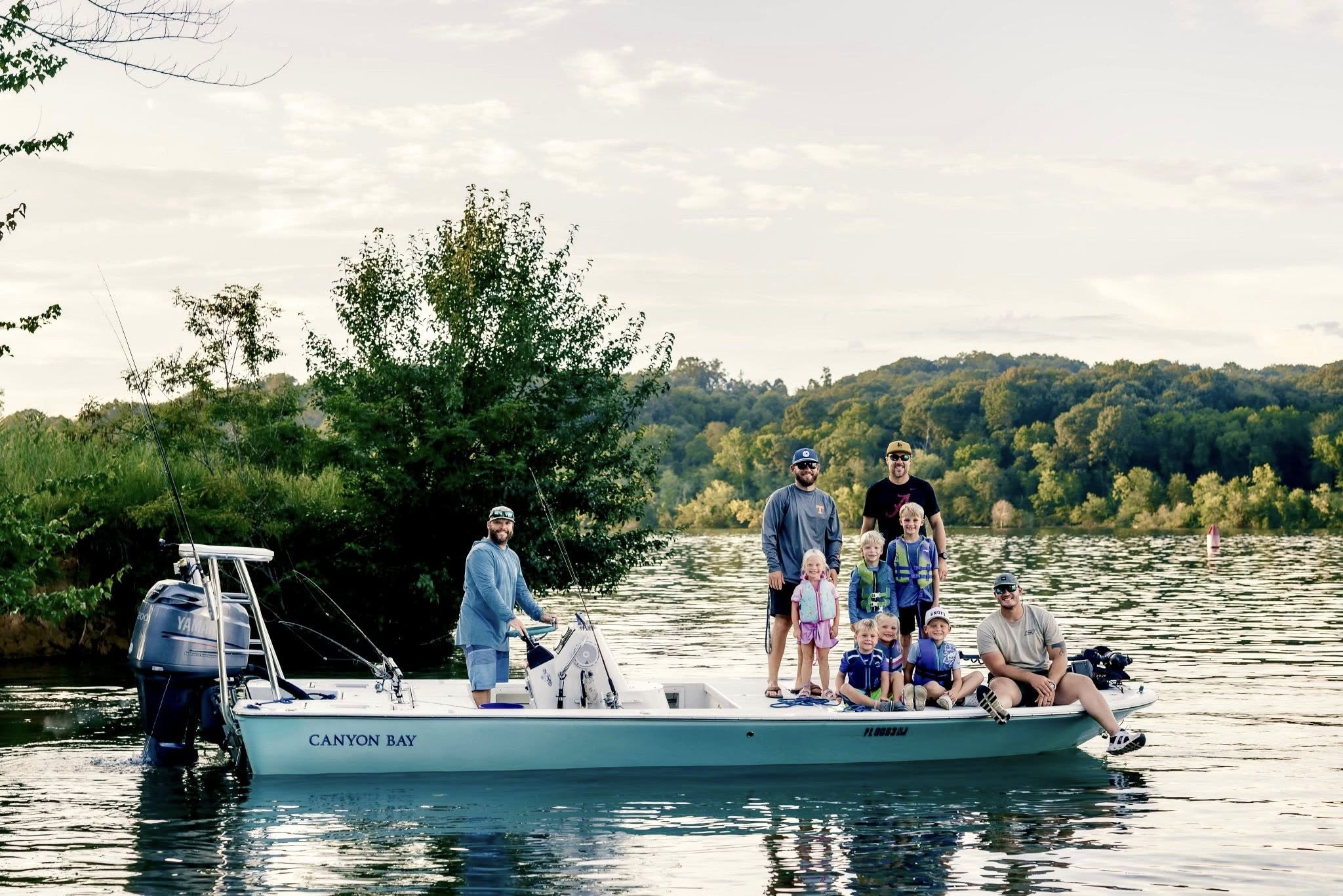 Group of 10 people enjoying fishing trip in Sevierville
