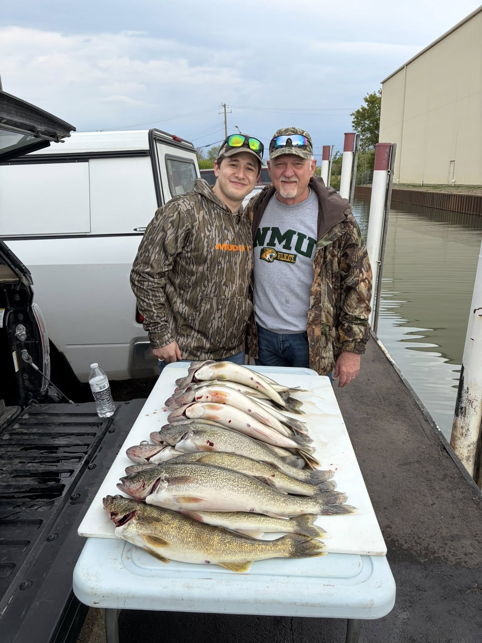 Fresh walleye catch displayed on cleaning table at Detroit MI fishing dock