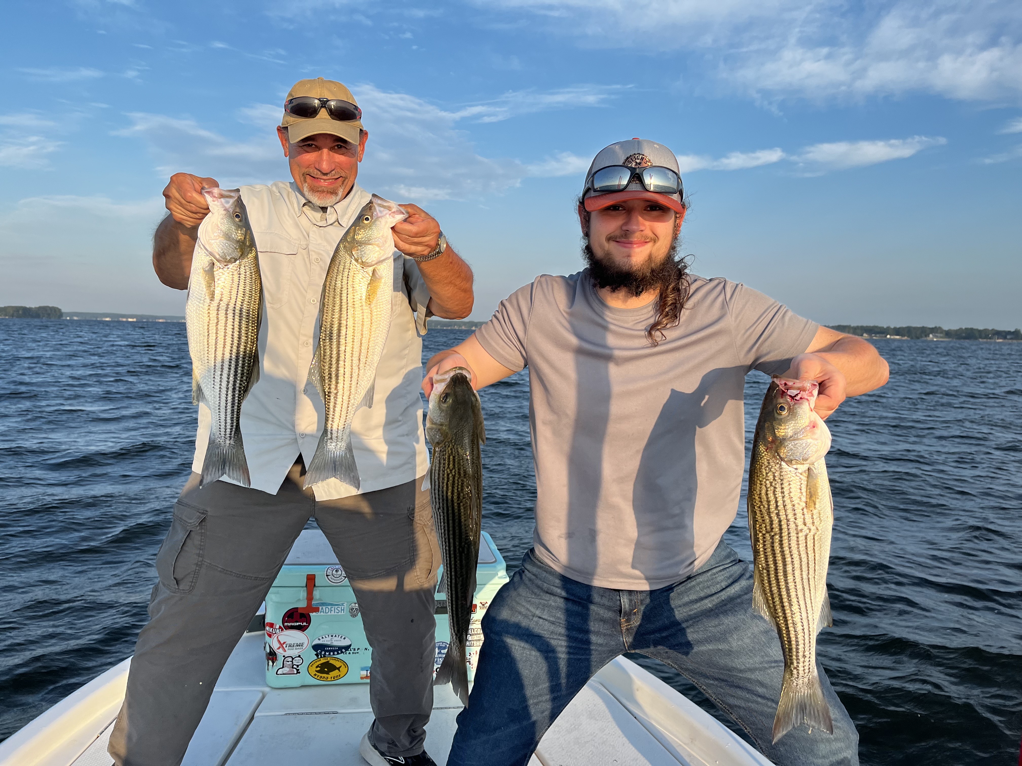 Four striped bass caught fishing in SC
