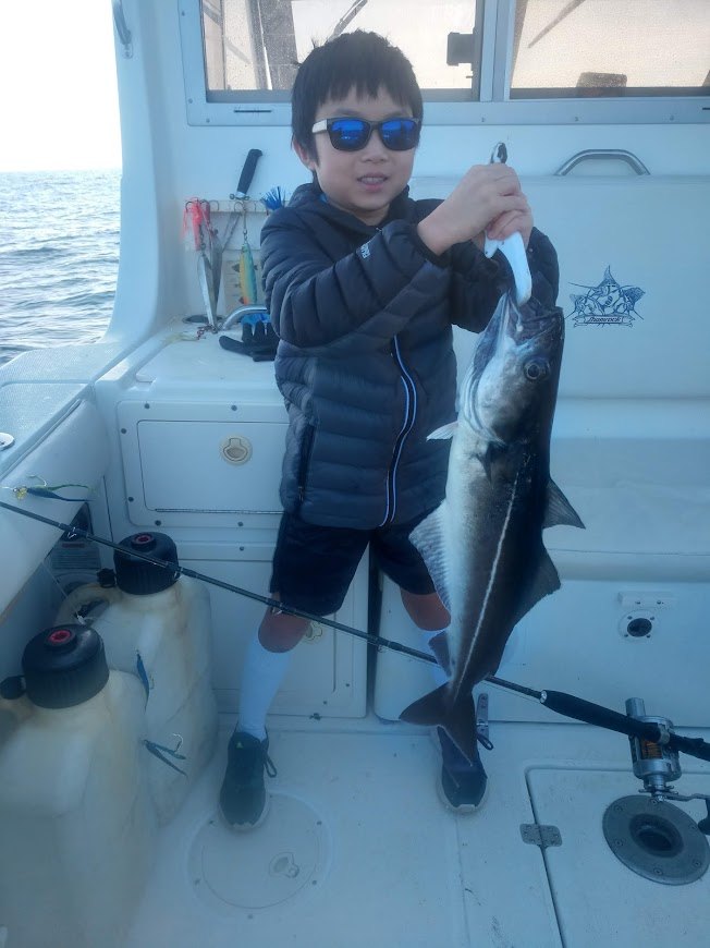 Angler with a 22-inch fish in Newington