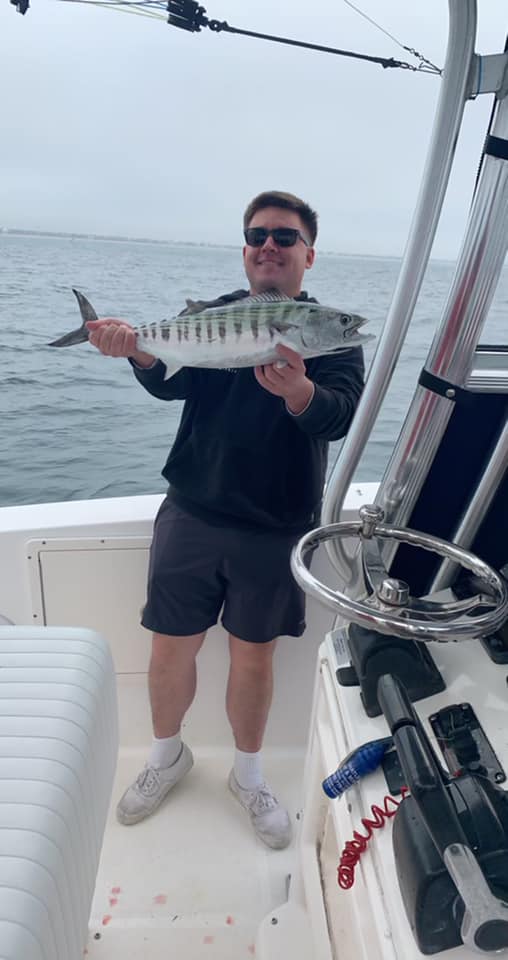 A person with a fishing rod in North Carolina