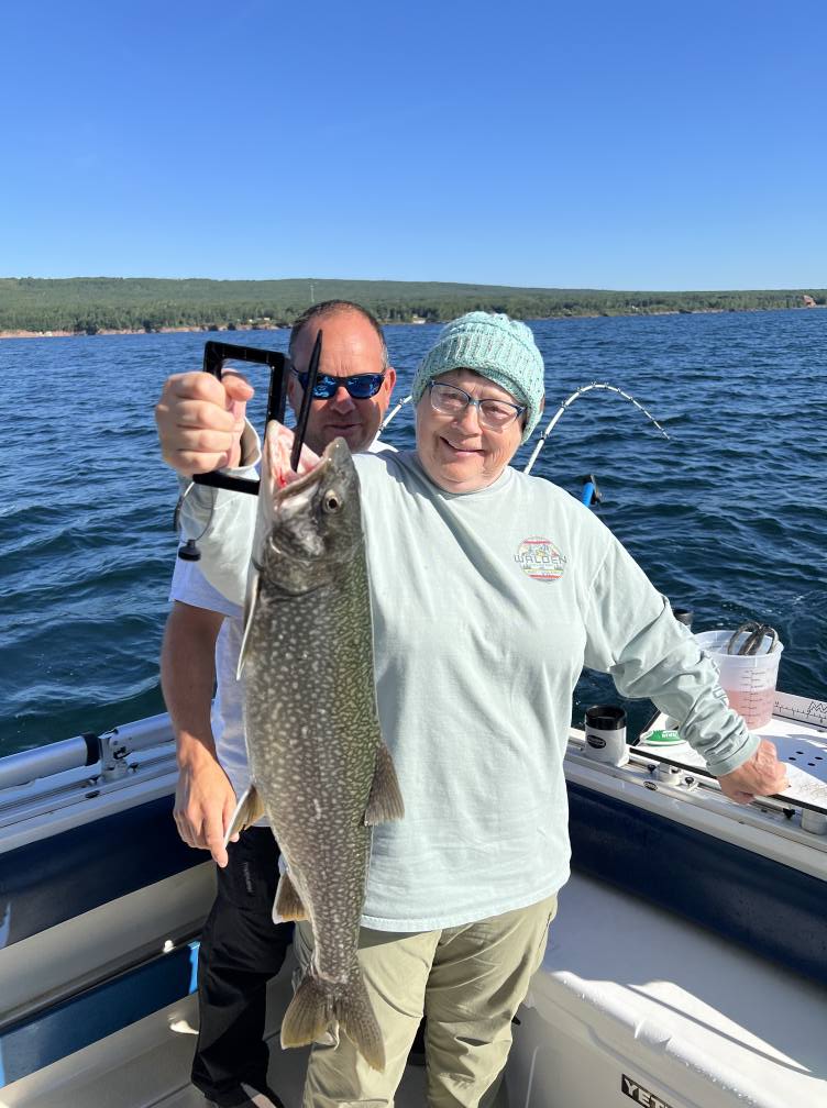Anglers fishing for lake trout in Minnesota