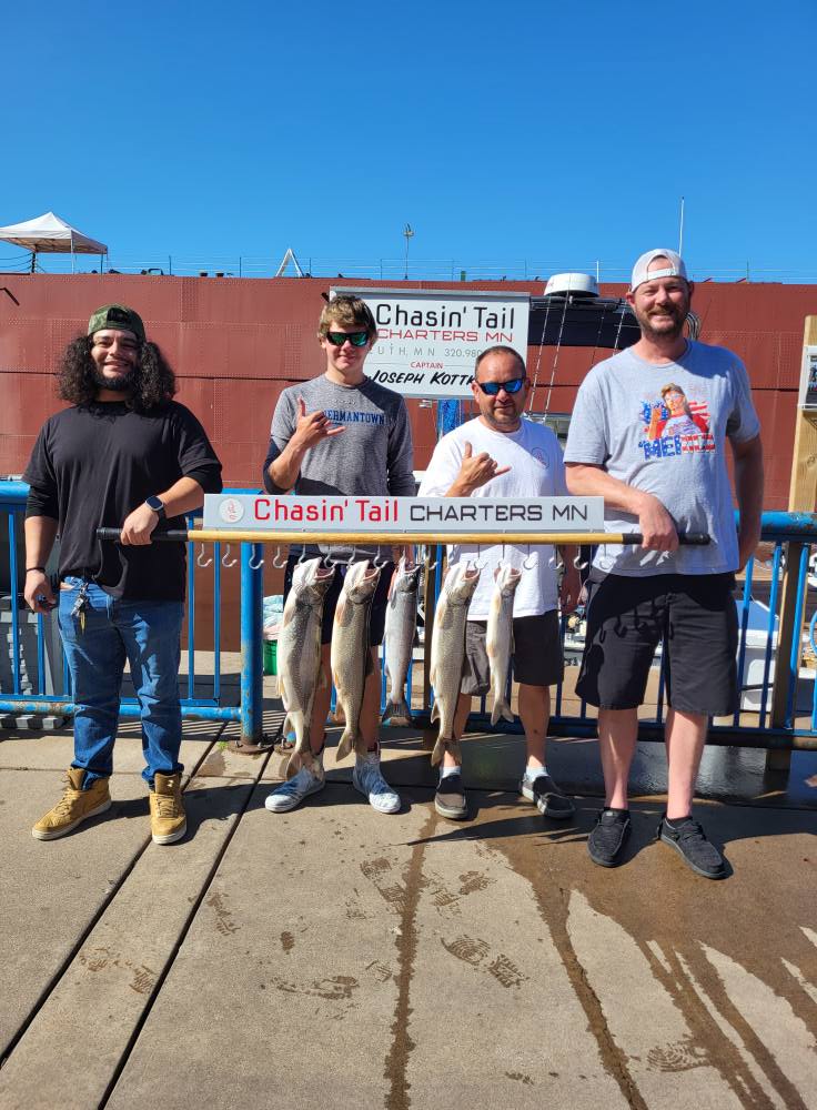 4 people fishing in Duluth