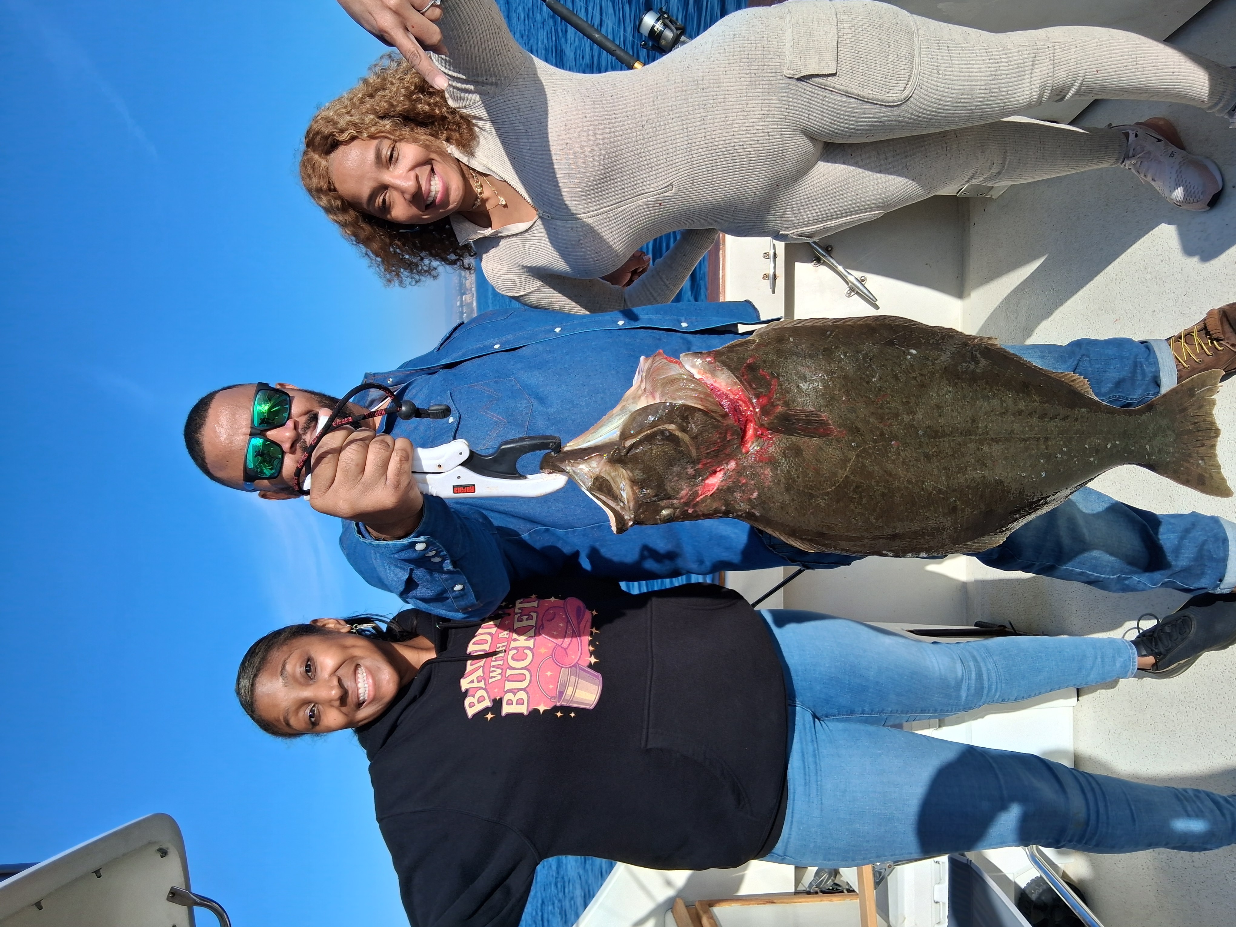 Three people on a cruise or tour in Dana Point