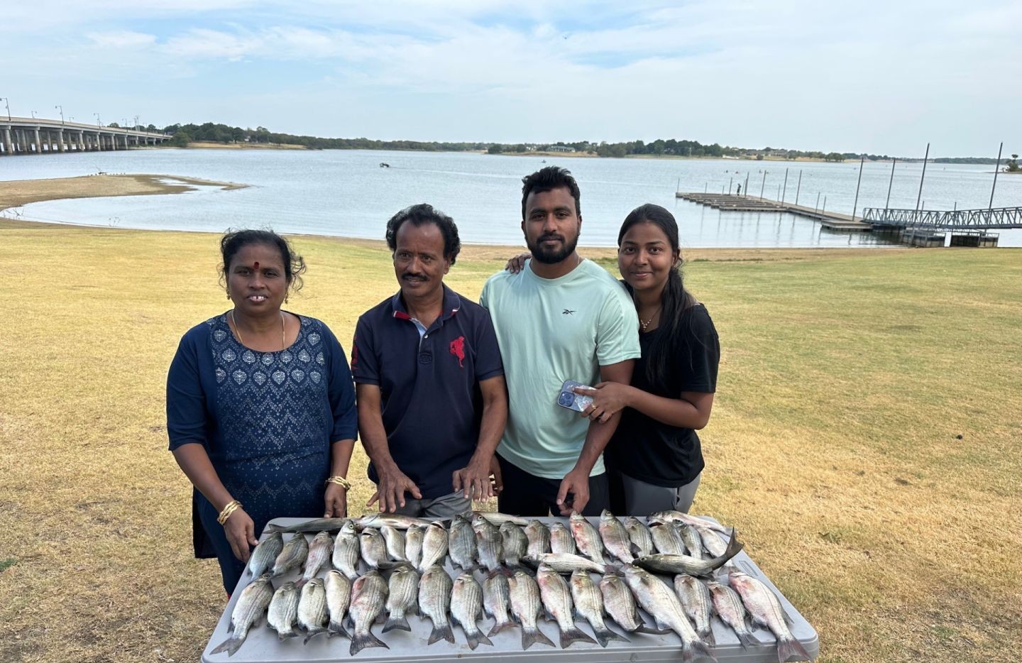 Four people fishing in Little Elm