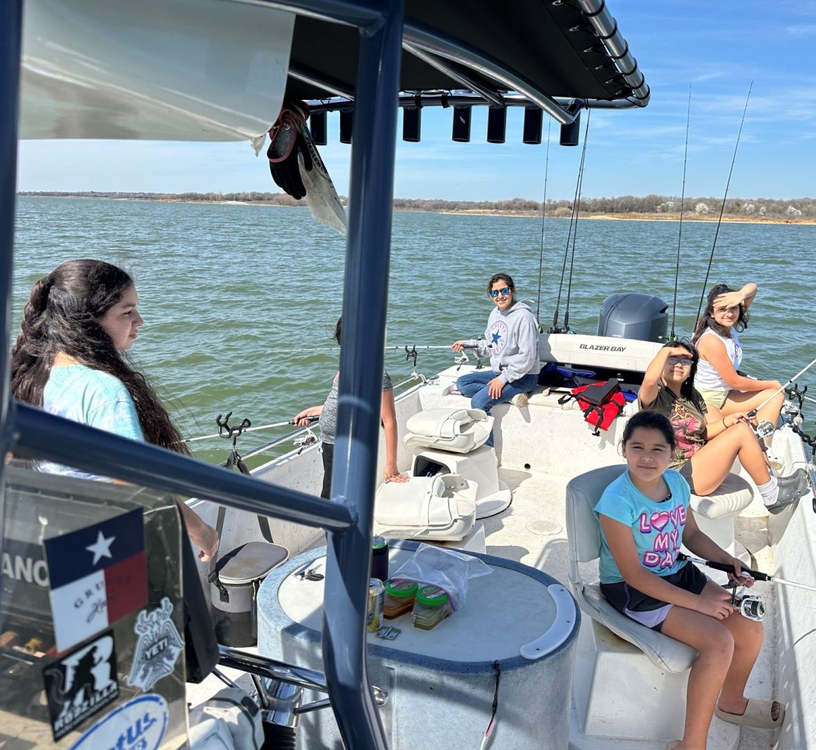 5 people fishing in TX