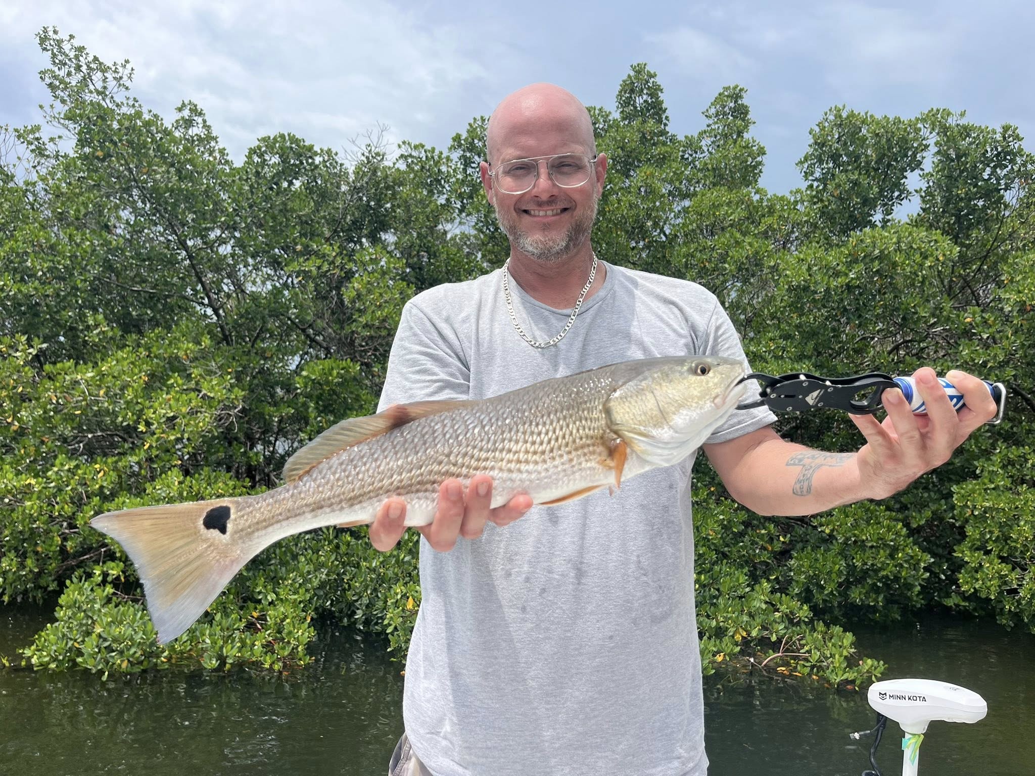 Angler catches a redfish in Florida